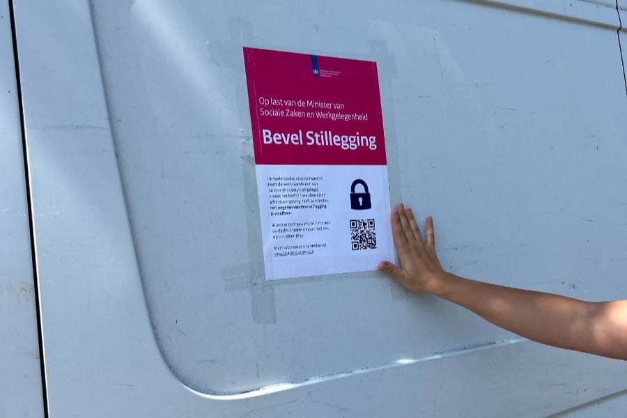 Dutch Transport Firm Fined €315,000, Operations Halted for Minimum Wage Violations