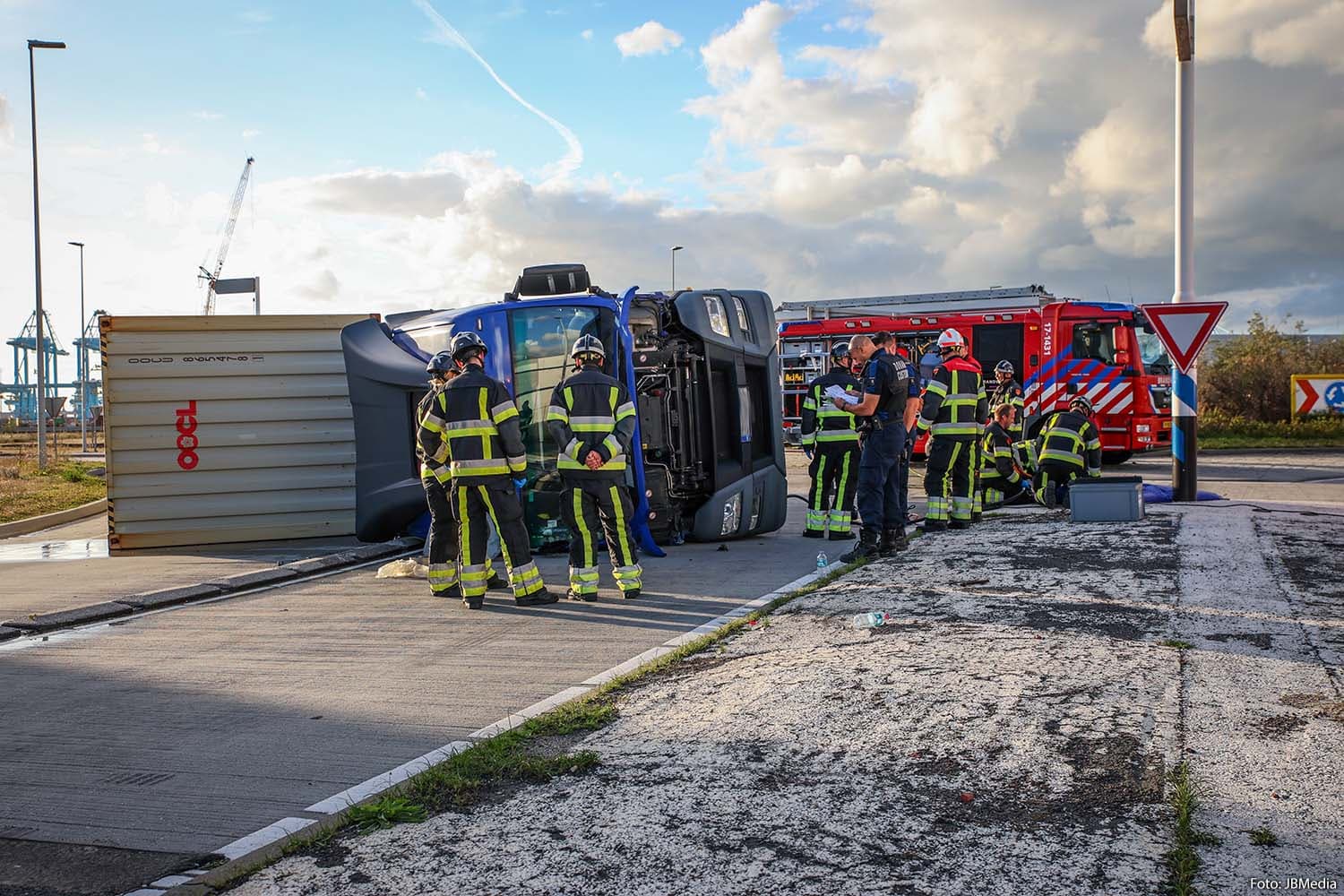 Truck Overturns with Container on Maasvlakte, Driver Hospitalized