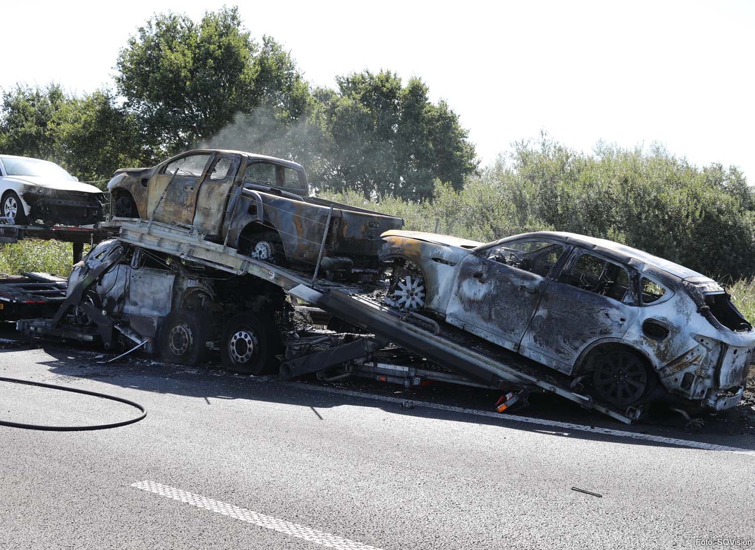 Multiple Vehicles Ablaze on Car Transporter on A58 in Netherlands