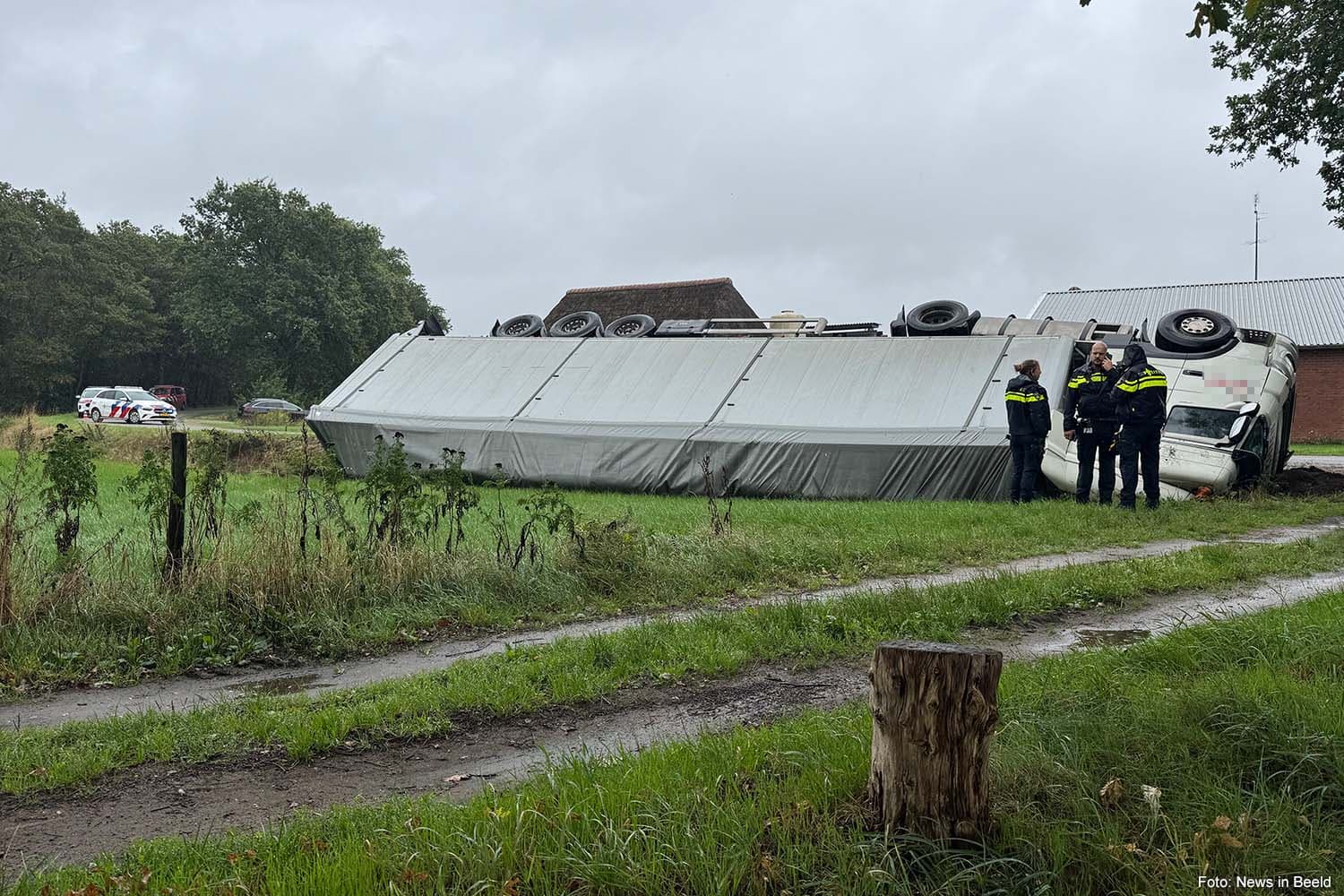 Truck Overturns into Ditch Near Holten, Driver Hospitalized